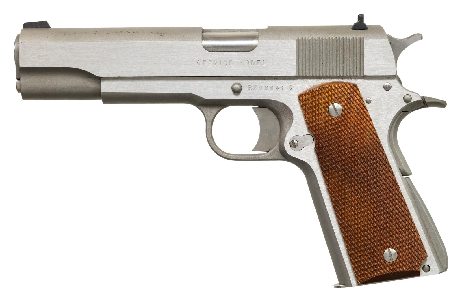 LEFT HANDED RANDALL SERVICE MODEL 1911 SEMI AUTO: PISTOL. Cal. 45 ACP. S# RF03041C. Bbl. 5". Blade front sight. Square notch rear sight. Scarce left handed Randall Service Model 1911 pistol with only 297 made. Stainless finish. Checkered hardwood gri