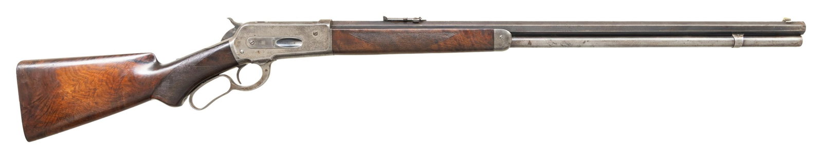 ANTIQUE WINCHESTER 1886 DELUXE LEVER ACTION RIFLE.: Cal. 40-82 WCF. S# 9959. Mfg. 1887. This honest 1886 Deluxe is fitted with a 28" octagon bbl that has dovetailed front sight with German silver insert and adjustable leaf sporting sight rear sight tha