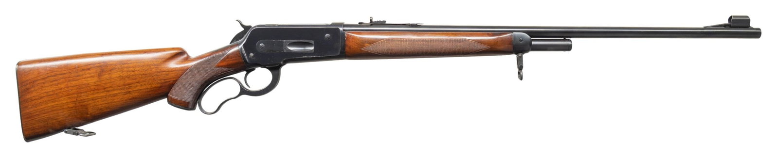 1ST MODEL WINCHESTER MODEL 71 DELUXE LEVER ACTION: RIFLE. Cal. 348 Win. S# 26129. Mfg. 1948. This nice 1st model long tang 71 deluxe is fitted with a standard 24" bbl with ramp mounted hooded bead front sight & clover leaf elevator adjustable sporting