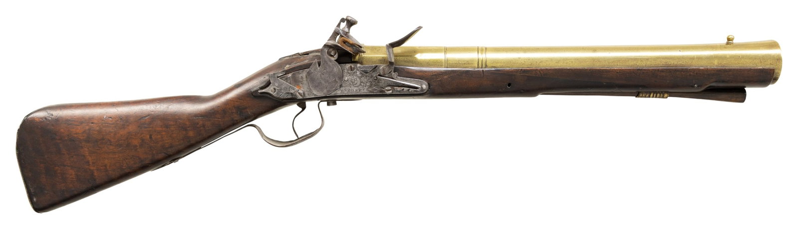 DOG LOCK BRASS BARREL BLUNDERBUSS BY R. SILKE OF: LONDON CIRCA 1690. Cal. 1.50" at muzzle. NSN. The 16" barrel with raised breech area transitions from octagonal, to sixteen sided, to round, through a turned band and then flares to muzzle. Very early