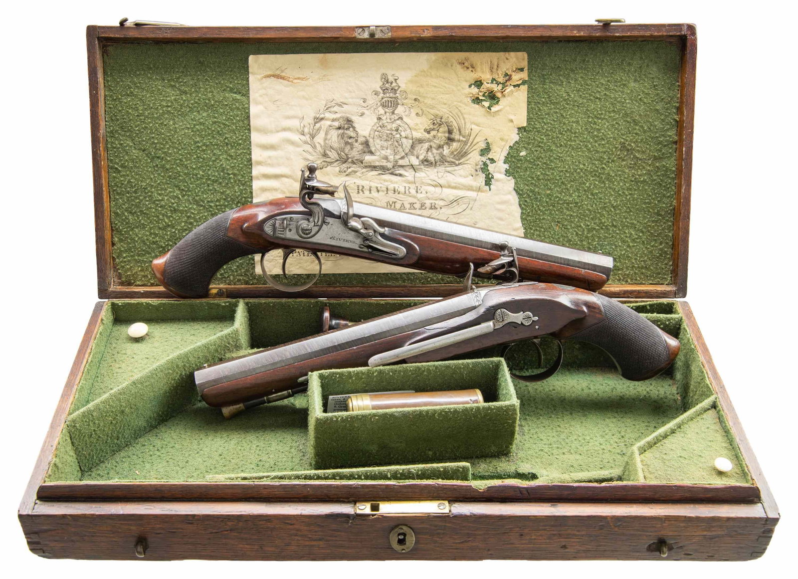 CASED PAIR OF BRITISH FLINTLOCK BELT PISTOLS BY: RIVIERE. Cal. 62. NSN. Bbl. 8". Isaac Riviere worked in London between 1809-1851. These pistols have 8" twist oct. bbls. engraved "LONDON" on tops. Engraved breech irons have integral U-notch rear sig