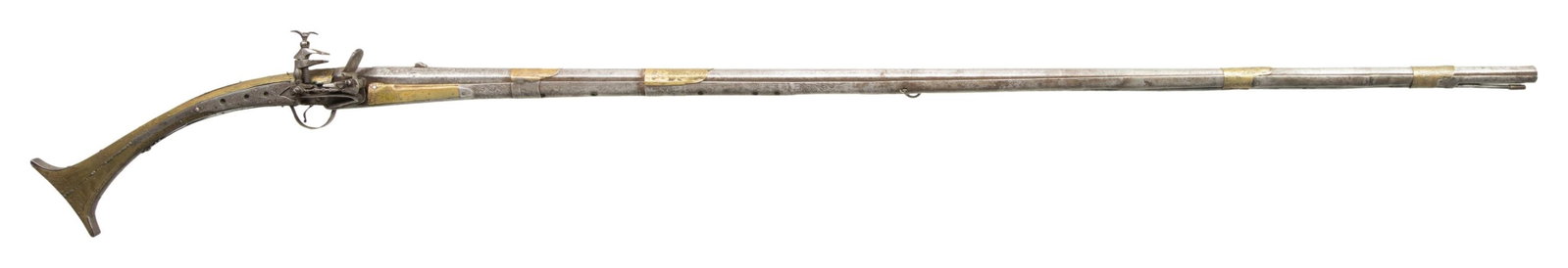 BALKAN STYLE MIQUELET MUSKET.: Cal. 60. NSN. Round. 50" bbl. w/ rear sighting groove. Miquelet lock has indiscernible proof. Iron & brass plated stock w/ sling rings & engraved scroll patterns. CONDITION: iron parts have gray patin