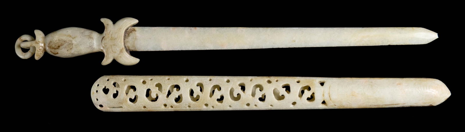 CHINESE WHITE JADE SWORD & SCABBARD.: The overall length of this decorative white jade sword is 22 3/4" with a blade measuring 15 1/4". The plain blade fits into a traditionally shaped Chinese sword hilt completely carved from white jade.