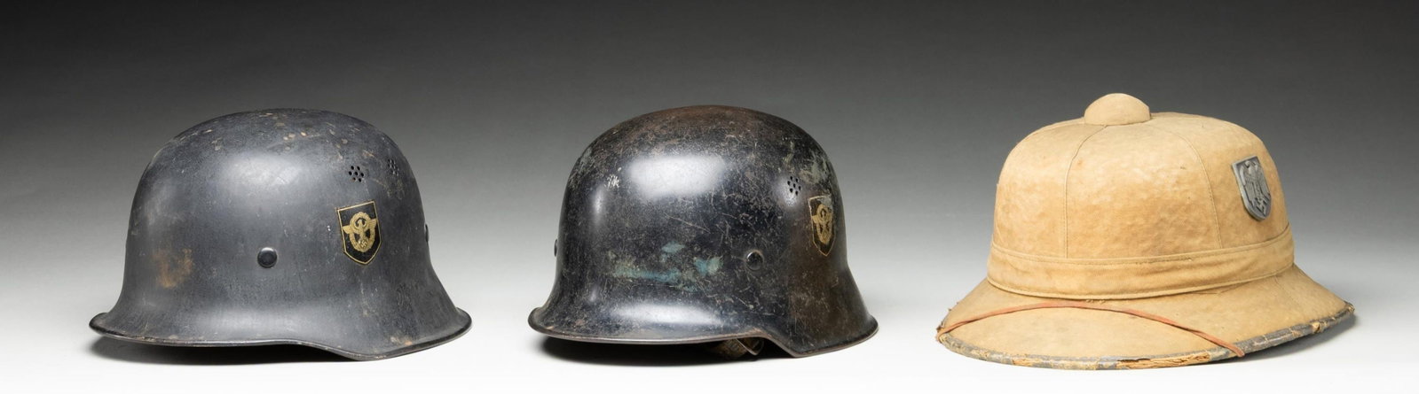 3 WWII GERMAN HELMETS. - 2