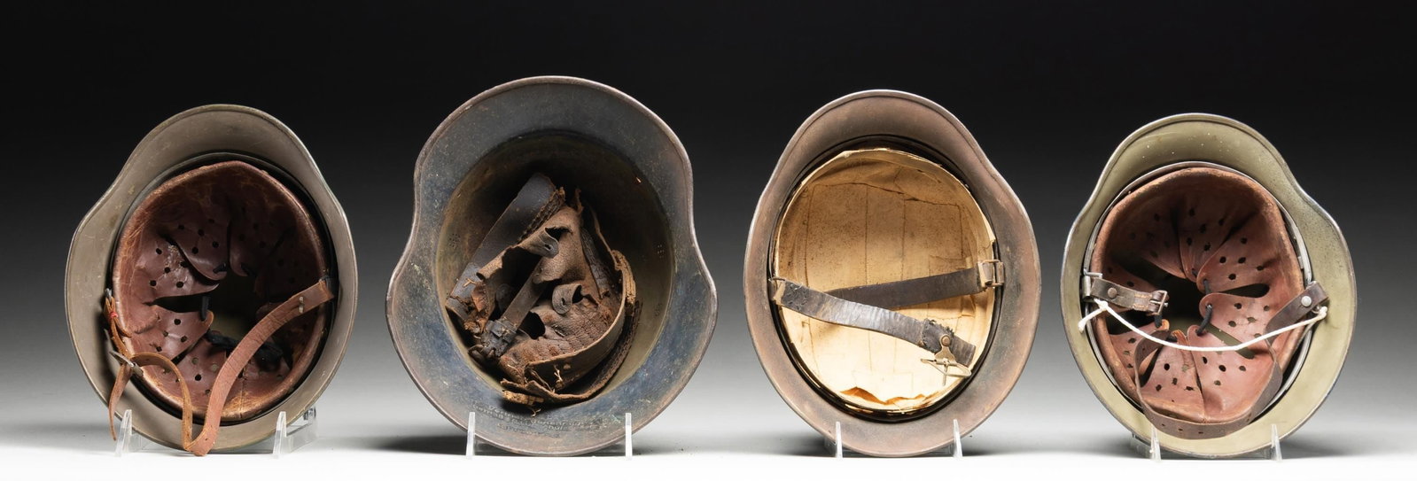 4 WWII GERMAN HELMETS. - 3