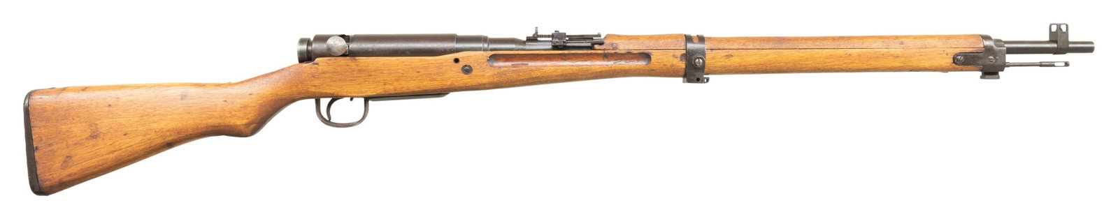 TJK T99 ARISAKA BOLT ACTION RIFLE.: Cal. 7.7 Jap. S# 10252. Bbl. 25 1/2". Standard early T99 sights with rear having AA wings. Parts have mismatch numbers. Bolt handle & safety are matching, while dust cover is mismatched & other parts 