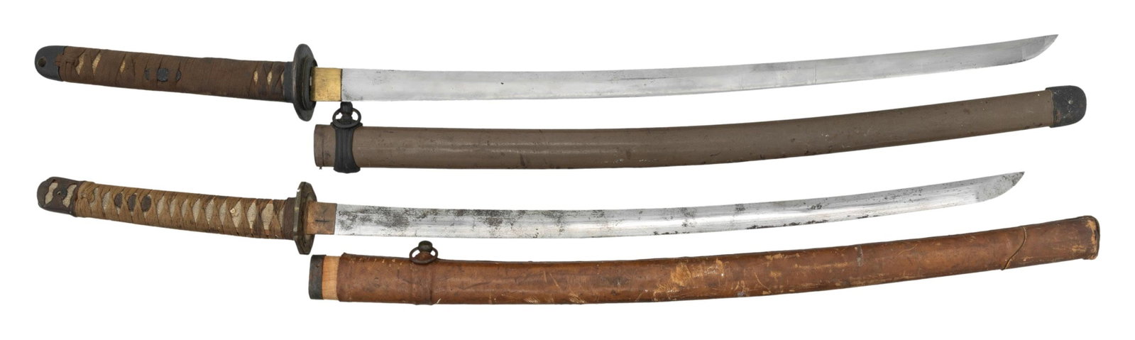 2 JAPANESE KATANA.: 1) A shin-gunto katana measuring 39" overall with a 26" blade no noticeable hamon and a copper habaki. Classic 4 cherry blossom gilded brass tsuba with two seppa above and below. Unsigned nakago with 