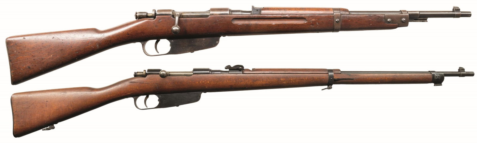 2 ITALIAN CARCANO BOLT ACTION RIFLES.: 1) FINN MARKED TERNI M38. Cal. 7.35 Carc. S# D7071. Bbl. 21". Blade front sight. Fixed rear sight. Matching numbers on stock & bbl. Bbl. has 1939 date, Terni arsenal & boxed Finnish Army "SA"