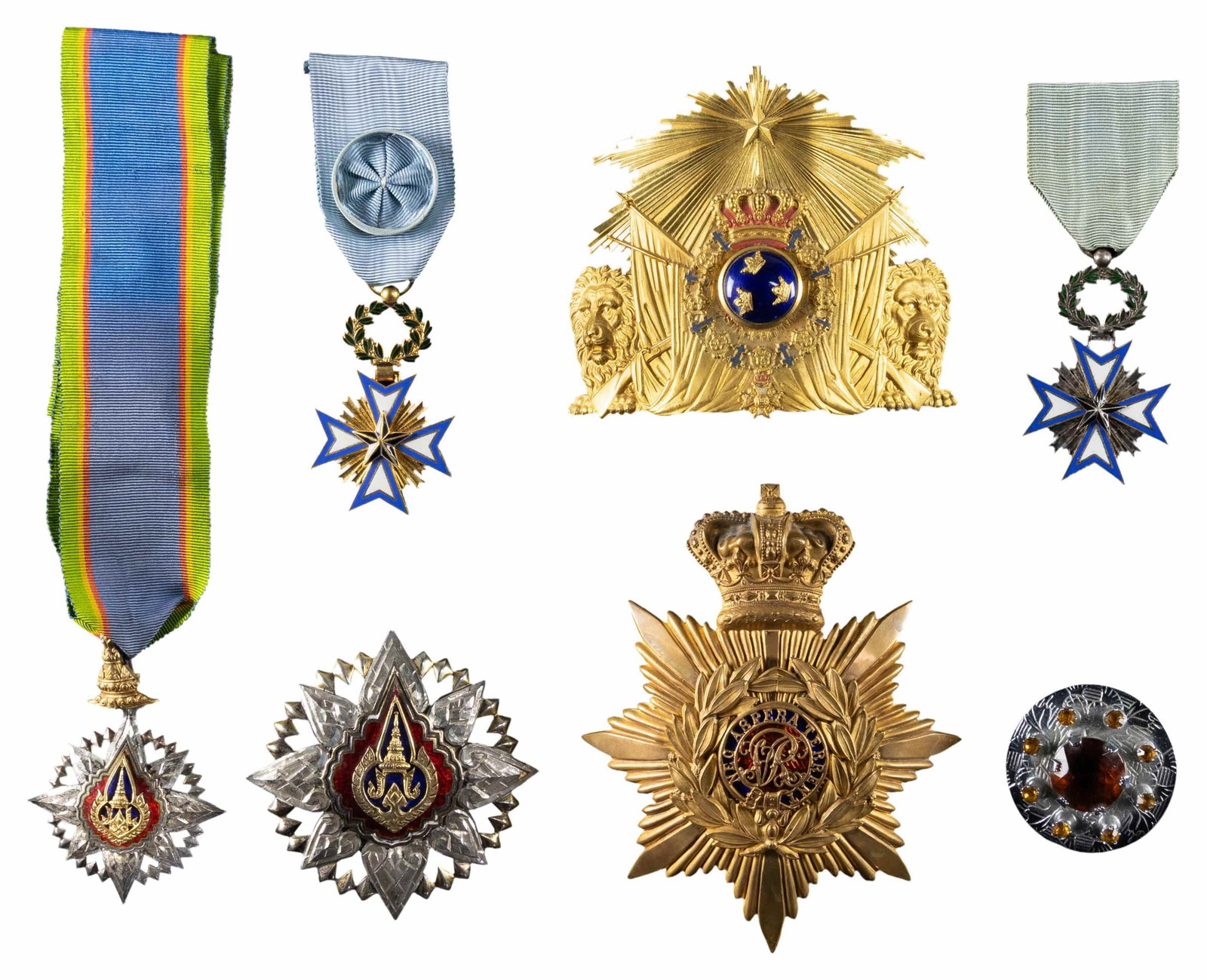 FOREIGN MEDALS AND HAT PLATES.: 1-2) Thai Order of the Crown of Thailand Second Class neck order with full ribbon and breast star in silver gilt. 3) British post 1878 Royal Military College Gentleman-Cadet helmet-plate. 4) Swedish M