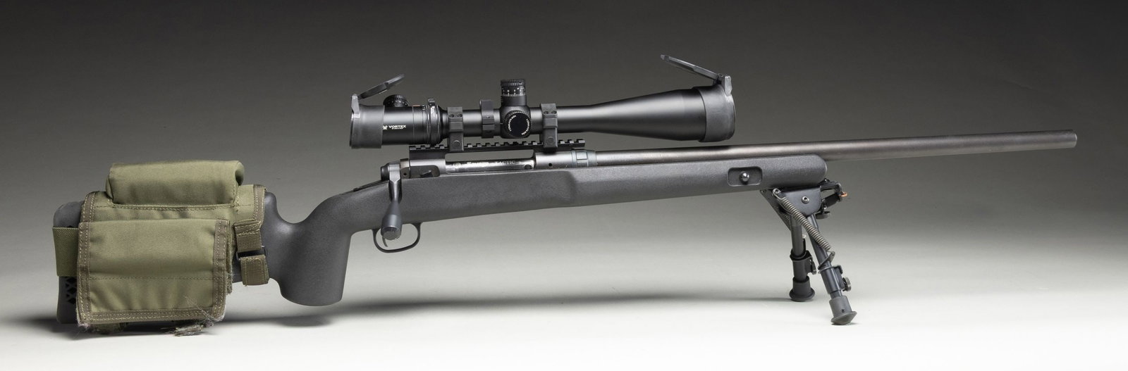 30-06, SAVAGE 110 TACTICAL BOLT ACTION RIFLE WITH: VORTEX VIPER SCOPE. Cal. 30-06. S# P796738. Free floating 24" w/ recessed crown. Vortex Viper 6-24x50 illuminated mil-dot reticle scope w/ scope caps & spirit level. Bolt has large knob. Black synthet