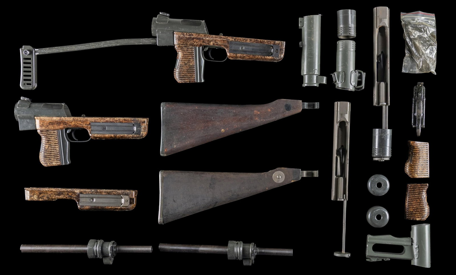 LOT OF 2 CZECH SA VZ. 26 SUBMACHINE GUN PARTS: KITS. Lot consists of x2 Czech Sa vz. 26 parts kits, consisting of: 1) x2 cut receivers, complete brown pressed resin housings, 2-piece grips, and trigger assemblies (x1 complete with steel