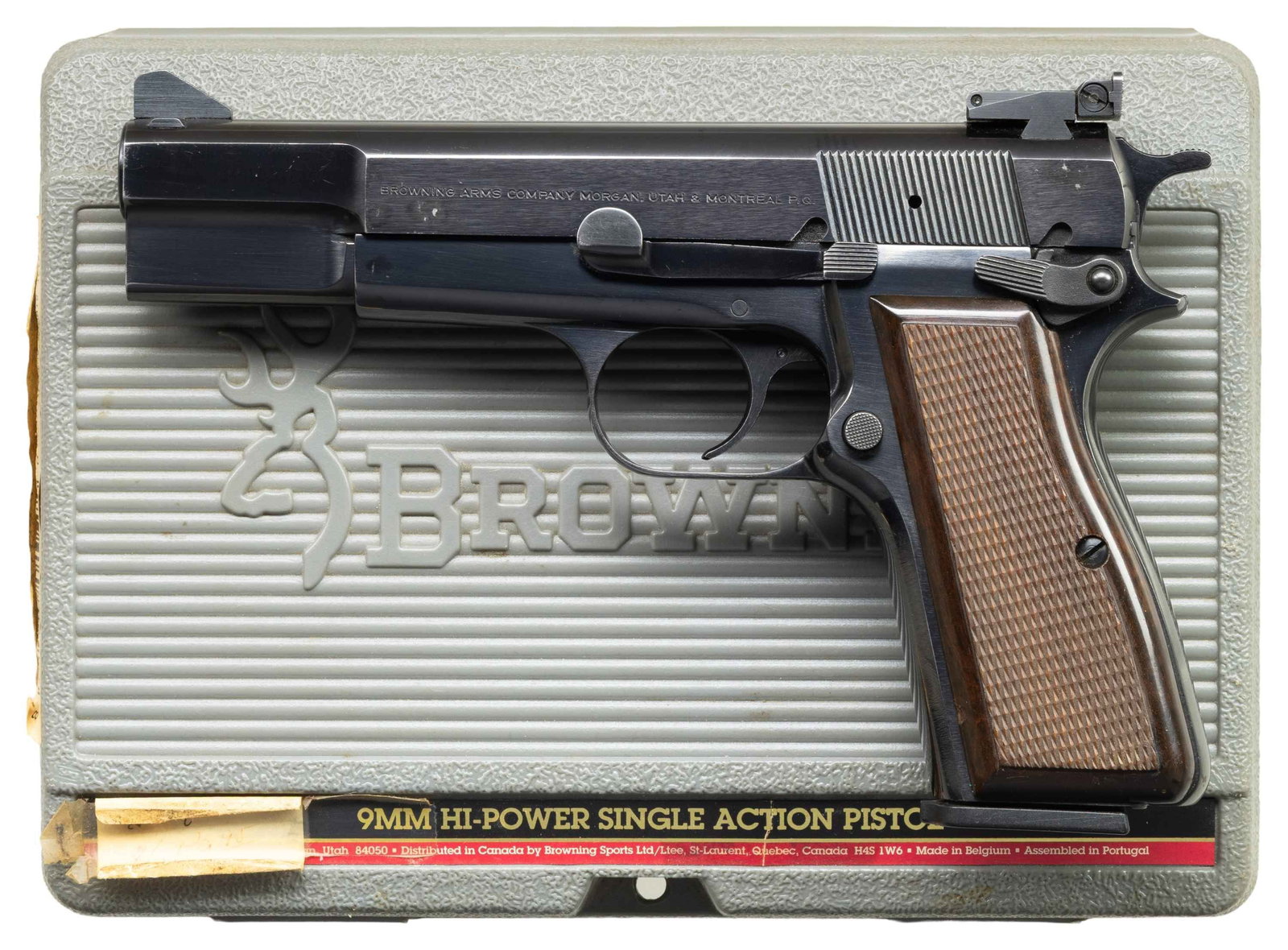 BROWNING HI POWER SEMI AUTO PISTOL WITH CASE.: Cal. 9x19. S# 245NT59136. Mfg. 1996 in Belgium & assembled in Portugal. Polished blued pistol with 4.75" bbl. Adj. rear & blade front sight. Checkered walnut grips. MAGS: 2 - 10 rd. & 1 - 32 rd.