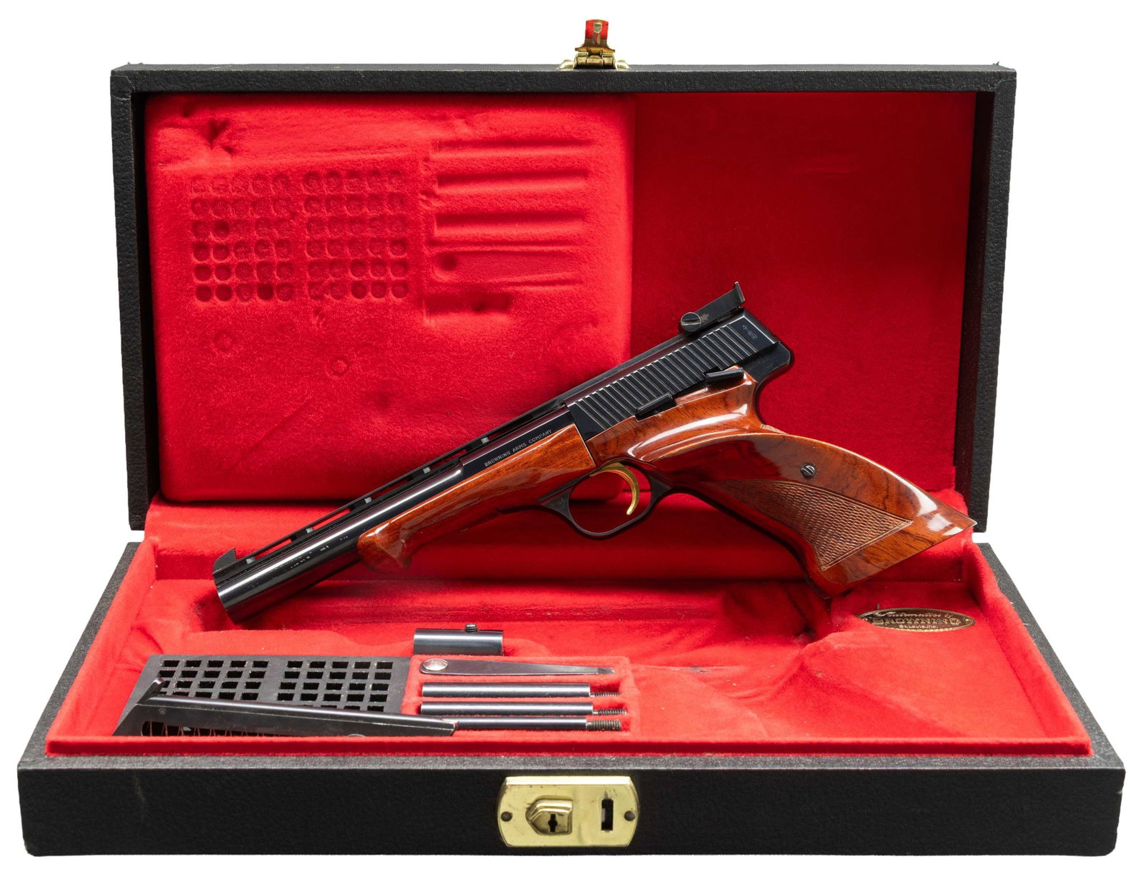 BELGIAN BROWNING MEDALIST SEMI AUTO PISTOL WITH: CASE. Cal. 22 LR. S# 86718T7. Mfg. 1967. VR 6.75" bbl. w/ target sights. Gloss blue finish. Gloss checkered walnut stock set with thumb rest. MAGS: 2 - 10 rd. UNATTACHED ACCESSORIES: Browning Medalist