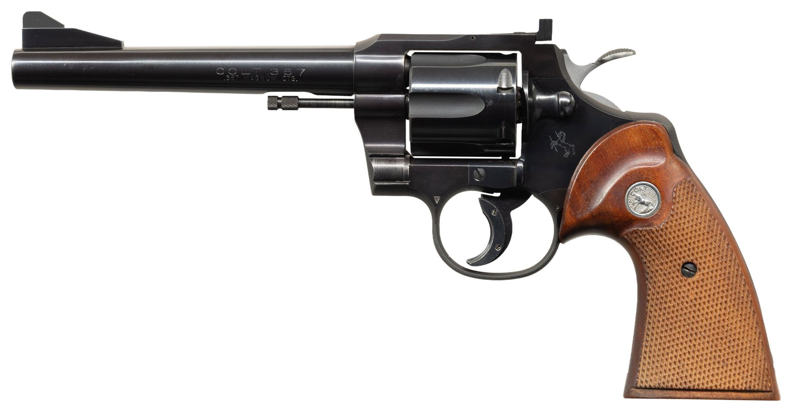 RARE & NEAR FINE COLT 357 DOUBLE ACTION REVOLVER.: Cal. 357 Mag. S# 7636. Bbl. 5 15/16". "Three-Fifty-Seven" double action revolver mfg. by Colt in 1955. Introduced in 1954 as a "deluxe" version of Colt's Trooper, the "Three-Fifty-Seven" was quickly o