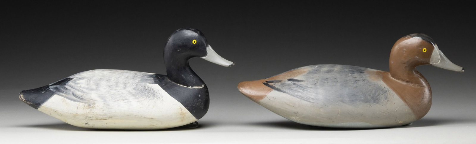 PAIR OF JIM CURRIER SPECIAL ORDER WOOD DECOYS. (1 of 5)