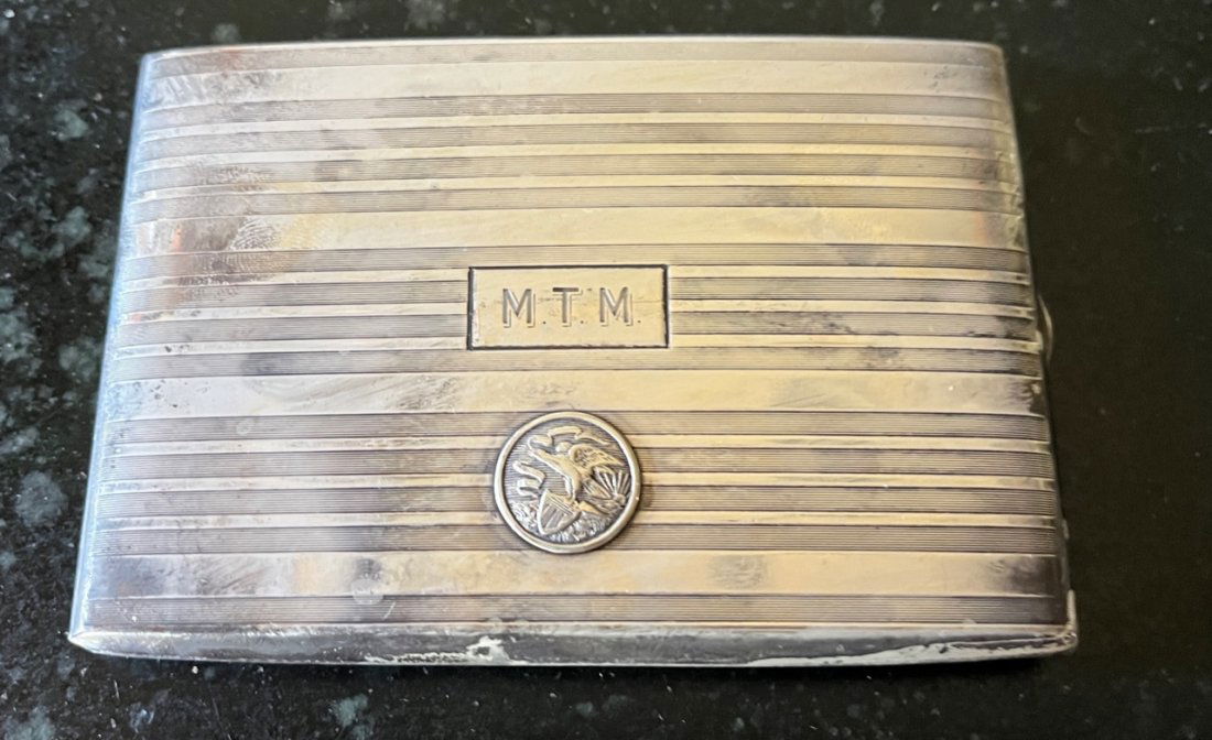 Cigarette case To M.T. Moore commemoration of the first round-the world passenger flight by Pan Amer (1 of 4)