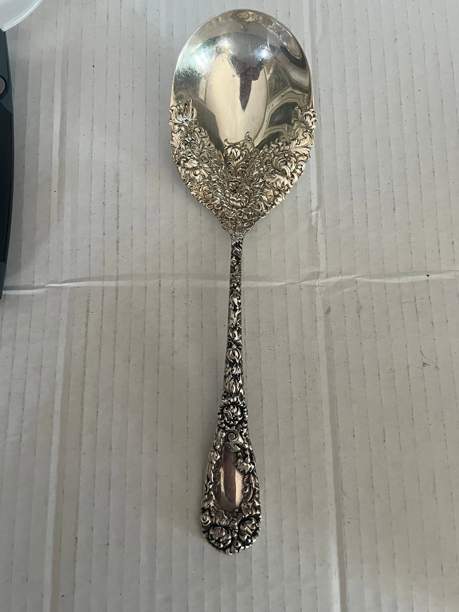Bigelow.Kennards&Co Sterling Ornate Serving Spoon: Beautiful ,Marked, needs some polishing 9” weight 115.86 grams