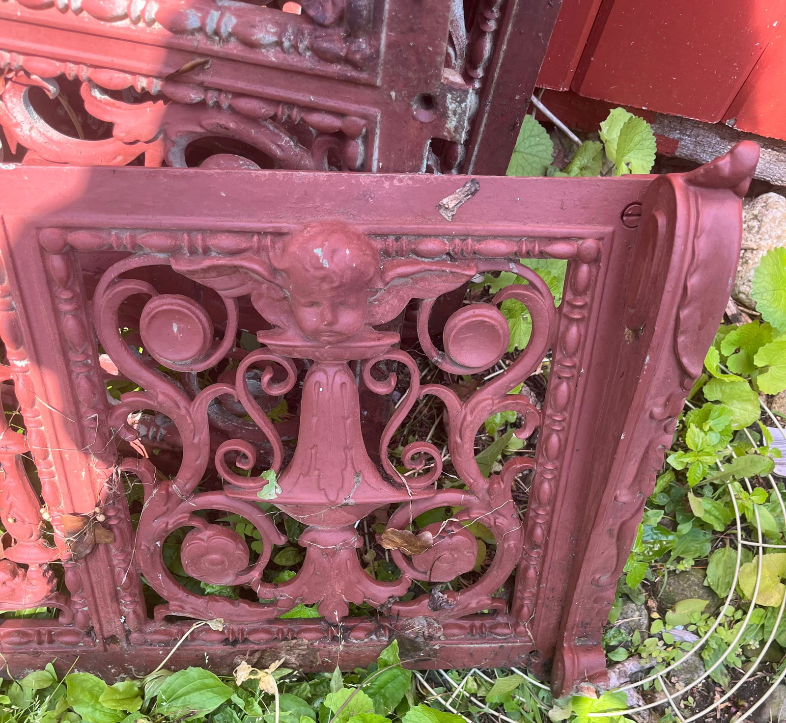 Victorian very Heavy Cast iron fencing with dolphins and Cherubs: There are 8 sections one has a bend on the end 38”L x 13”H