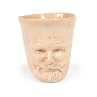 Robert Arneson, Self-Portrait (Shot Glass): Robert Arneson (American, 1930-1992) Self-Portrait (Shot Glass) ceramic 2"h x 2"w x 2 1/2"d Provenance: Property from the Collection of The Rev. Audrey Taylor Gonzalez, Memphis, Tennessee