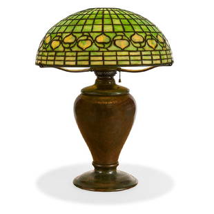 Tiffany Studios Acorn table lamp: Tiffany Studios Acorn table lamp: shade on an oil lamp base New York, New York leaded glass, patinated bronze stamped marks to shade, base unmarked electrified 16"dia x 20 1/2"h overall