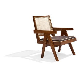 Pierre Jeanneret Low Lounge Chair, #PJ-SI-29-A: Pierre Jeanneret (1896-1967) Low Lounge Chair, model PJ-SI-29-A France/India, circa 1955-1956 teak, caning, upholstery 20 3/4"w x 28 1/2"d x 30"h Provenance: From the Chandigarh Administrative Buildin