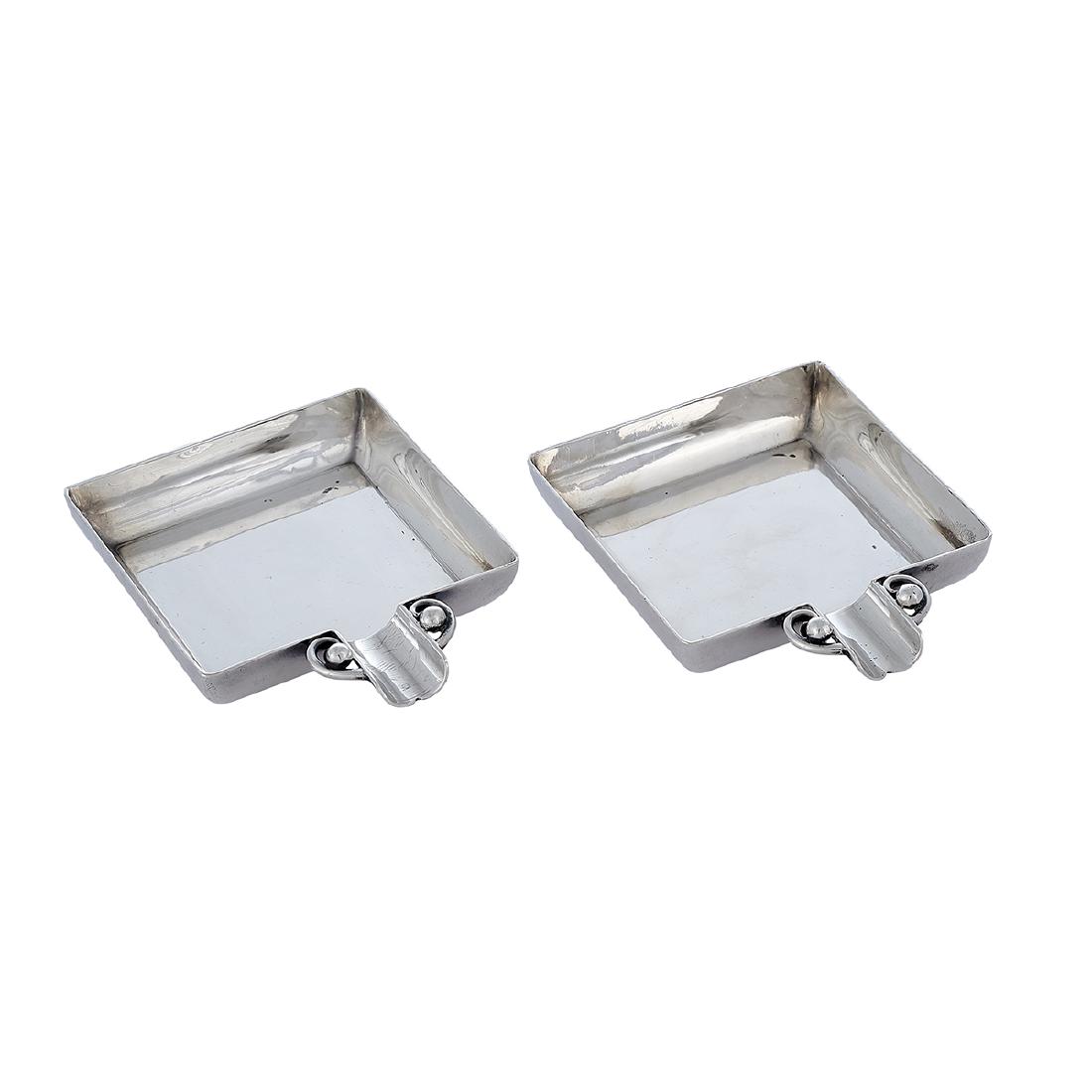 Kalo Shop ash receivers with scroll and ball: The Kalo Shop squared ash receivers with scroll and ball decoration, #18, pair Chicago, Illinois sterling silver stamped marks 3 1/8"w x 2 1/2"d x 5/8"h Provenance: The Paul & Terry Somerson Collectio