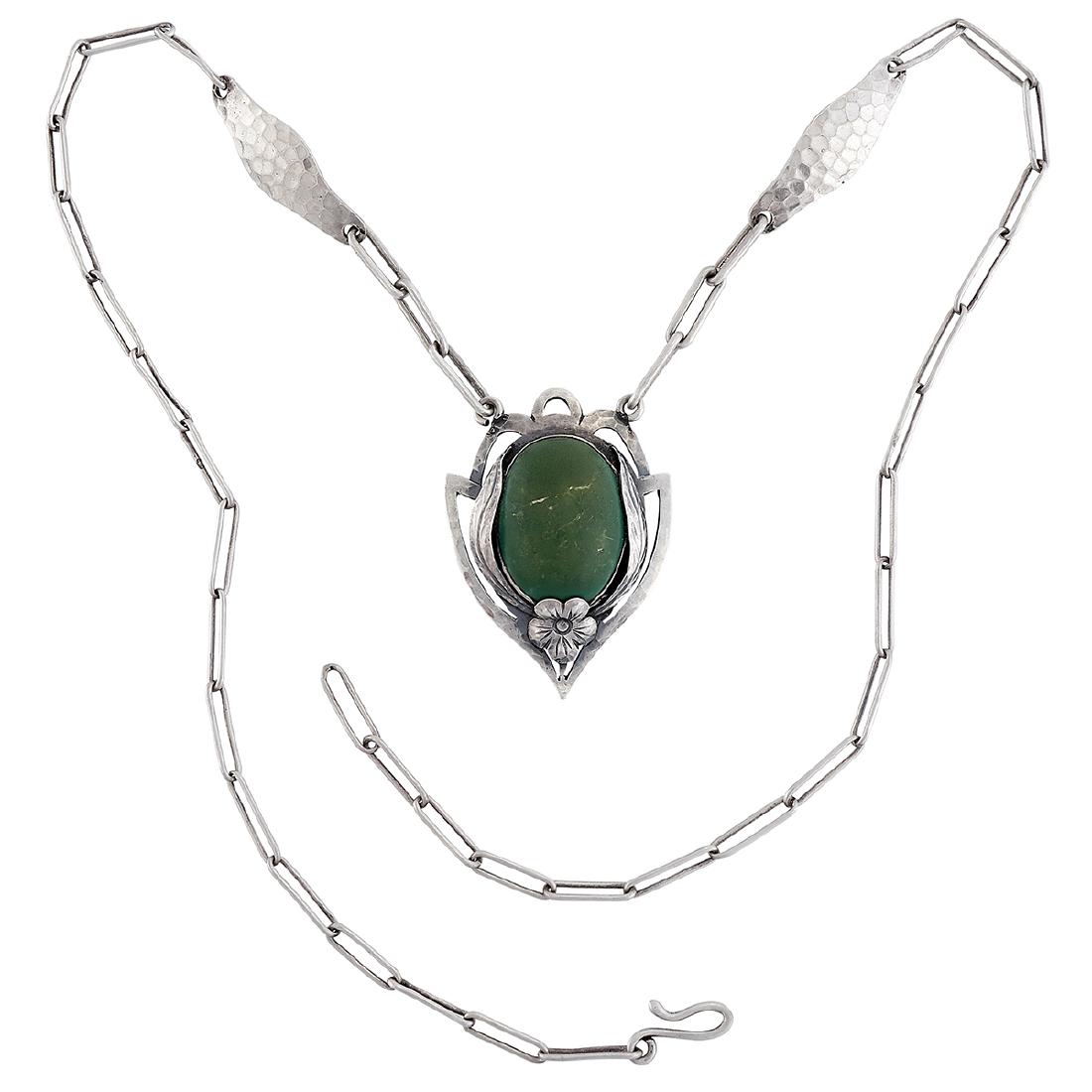 Odd Kraft Shop pendant necklace with turquoise: Odd Kraft Shop pendant necklace on an original chain Chicago, Illinois sterling silver, turquoise stamped marks applied foliate decoration inset with an oval cabochon stone pendant: 15/16"w x 1 5/16"h
