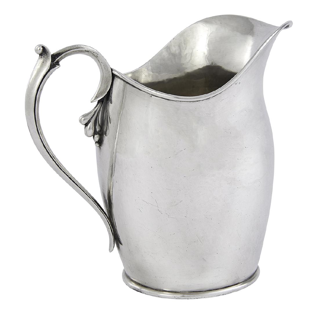 Cellini Shop sterling silver water pitcher: The Cellini Shop water pitcher, #S33 Evanston, Illinois sterling silver stamped marks 8 7/8"w x 5 1/4"d x 8 3/16"h Provenance: The Paul & Terry Somerson Collection of 20th and 21st Century Metalwork a
