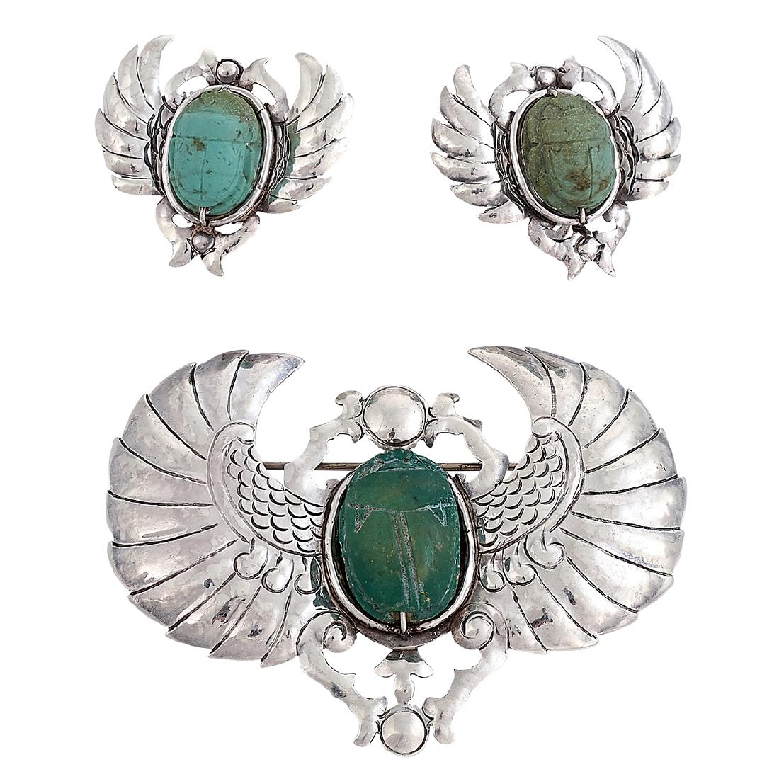 Doris Cliff Scarab brooch and earrings set: Doris Cliff (1885-1968) Scarab demi-parure: brooch and earrings California sterling silver, faience stamped marks each set with Egyptian carved beetles brooch: 2 5/8"w x 2"h; earrings: 1 1/4"w x 1 1/8