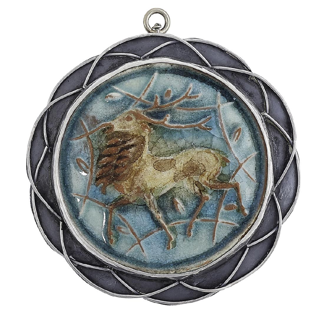 Lillian Foster Stag pendant w/ Karlsruhe roundel: Lillian R. Foster (1898-1976) Stag pendant with a Karlsruhe roundel Philadelphia, Pennsylvania and Weston, Connecticut sterling silver, majolica ceramic stamped marks 2 3/16"dia Provenance: The Paul &
