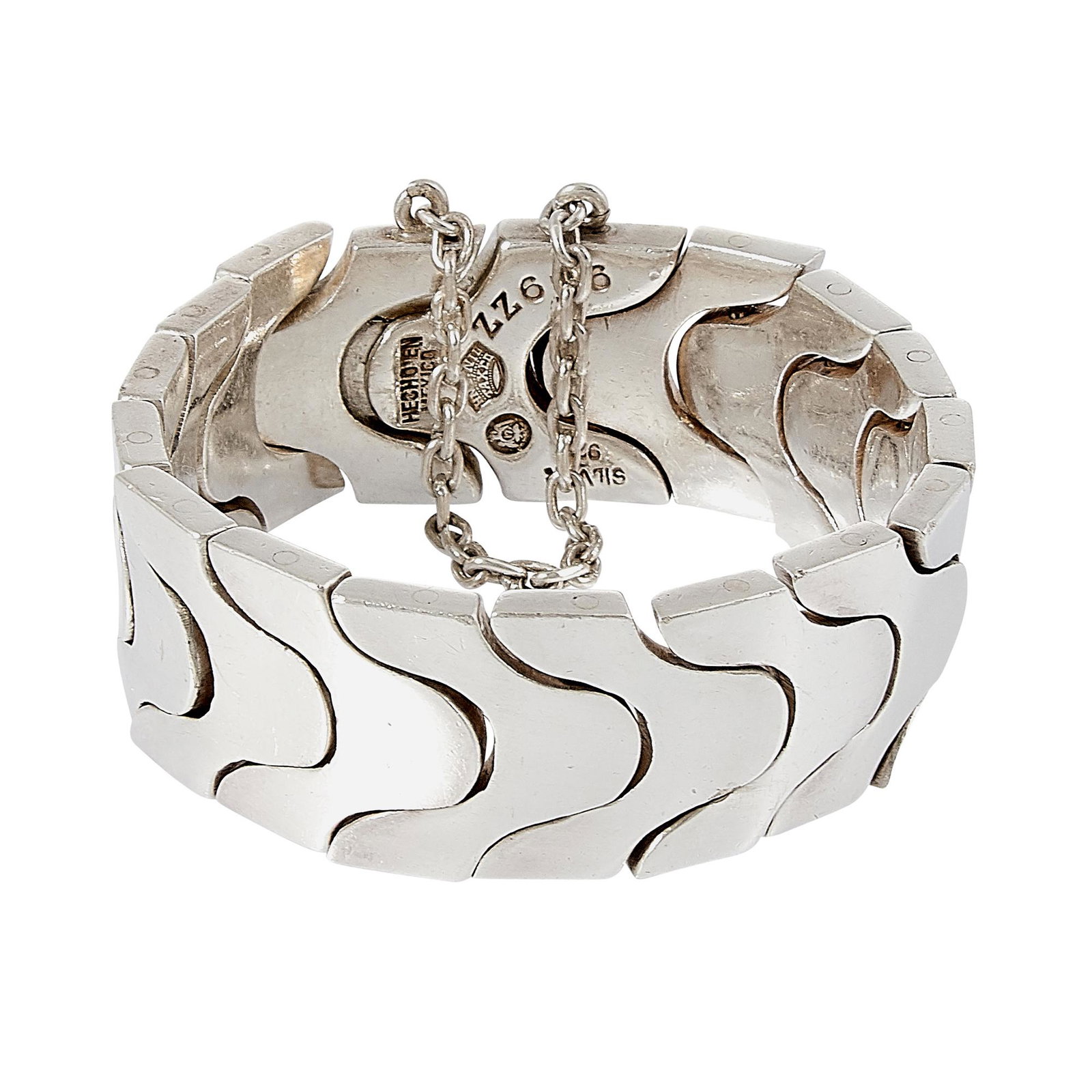 Antonio Pineda puzzle bracelet, #ZZ616: Antonio Pineda (1919-2009) puzzle bracelet, #ZZ616 Taxco, Mexico .970 silver stamped marks 13/16"w x approximately 7 1/4"l