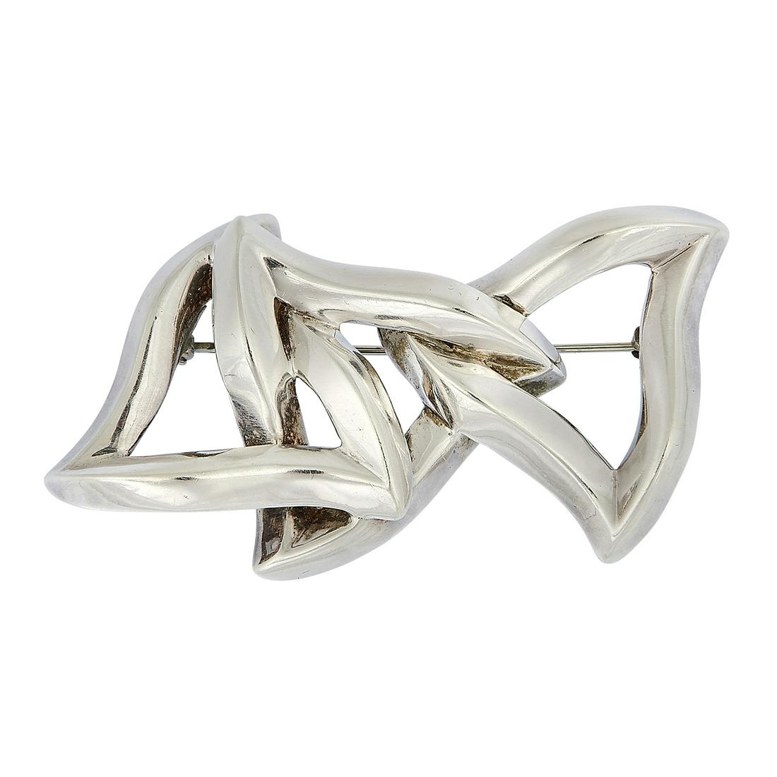 Angela Cummings (b. 1944) brooch: Angela Cummings (b. 1944) brooch USA, post-1984 sterling silver stamped marks 17.1 dwts, three interlocking triangles motif 2 5/8"w x 1 1/2"h