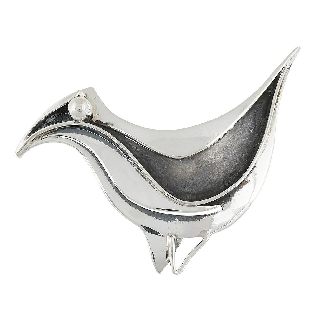 John Szymak bird brooch: John Szymak (1923-2007) bird brooch Dallas, Texas sterling silver stamped marks 11.1 dwts 3"w x 2 1/4"h Provenance: The Paul & Terry Somerson Collection of 20th and 21st Century Metalwork and Jewelry