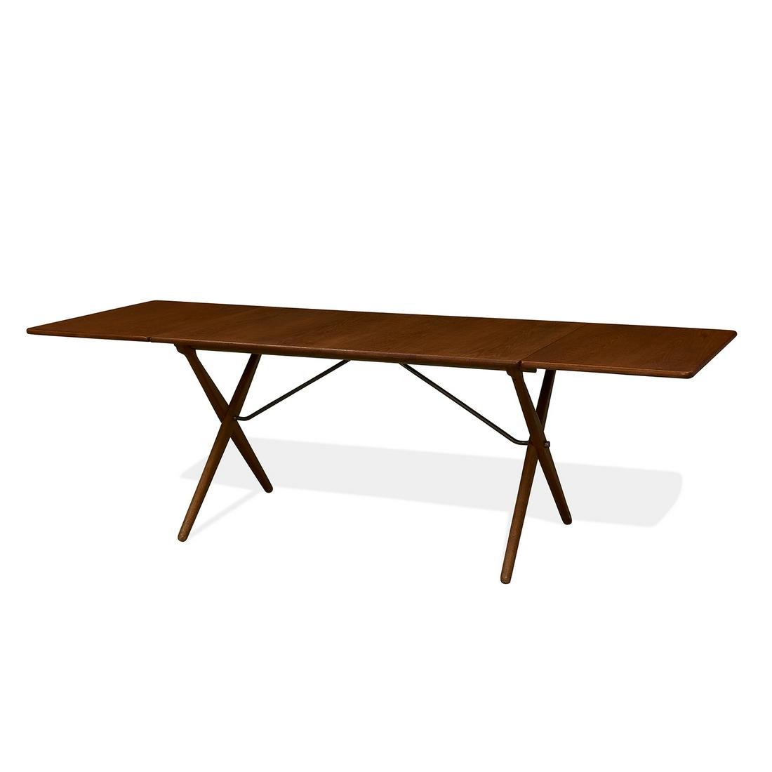 Hans Wegner for Andreas Tuck dining table: Hans Wegner (1914-2007) for Andreas Tuck drop-leaf dining table, #AT-309 Denmark, 1950s teak, oak, brass branded marks closed: 51 3/4"w x 34"d x 28"h; open: 89 3/4"