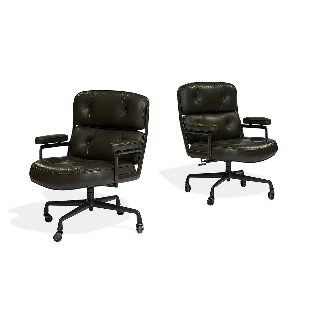 Charles & Ray Eames / Herman Miller desk chairs: Charles Eames (1907-1978) & Ray Eames (1912-1988) for Herman Miller Time Life desk chairs, pair USA, 1988 lacquered aluminum, dark brown leather metal tags and paper labels 27"w x 26"d x 35"h