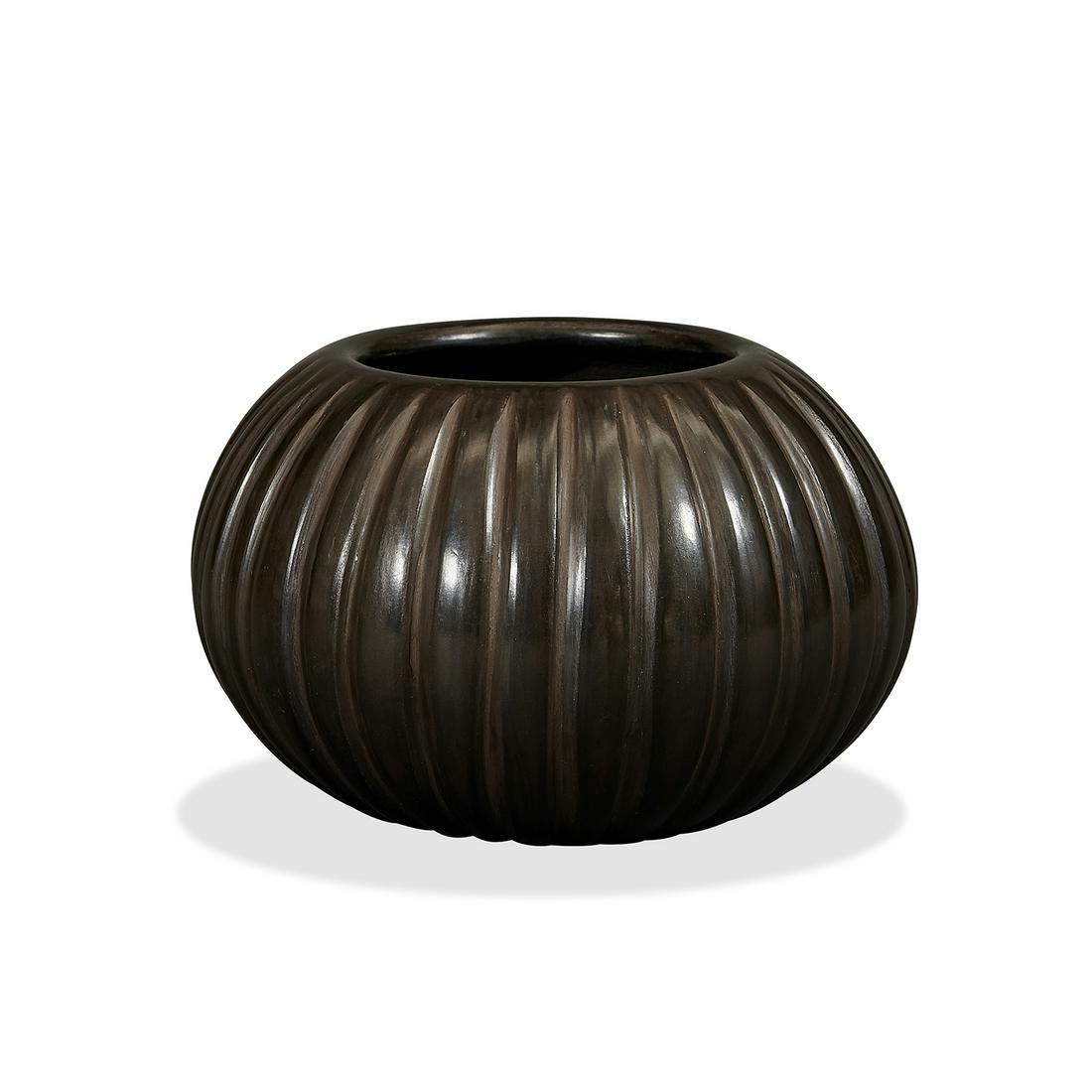 Angela Baca / Santa Clara Pueblo Black Melon bowl: Angela Baca (1927-2014) / Santa Clara Pueblo Black Melon bowl Santa Clara Pueblo, New Mexico carved blackware ceramic incised signature 6"dia x 3 3/4"h