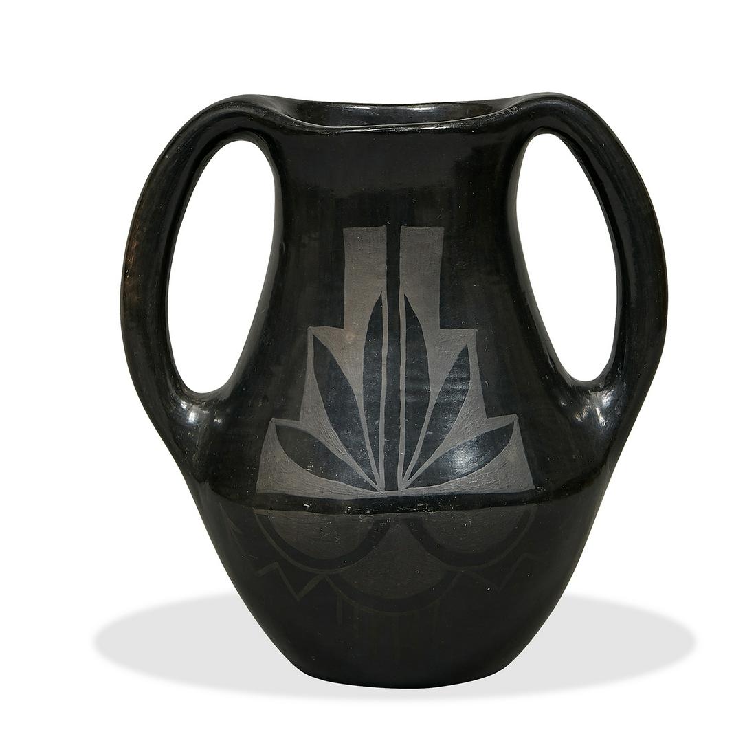 Frances Naranjo / Santa Clara Pueblo vase: Frances Naranjo (1936-2002) / Santa Clara Pueblo double-handled vase Santa Clara Pueblo, New Mexico black-on-black ware ceramic incised signature 7 3/4"w x 5 1/2"d x 8 1/4"h