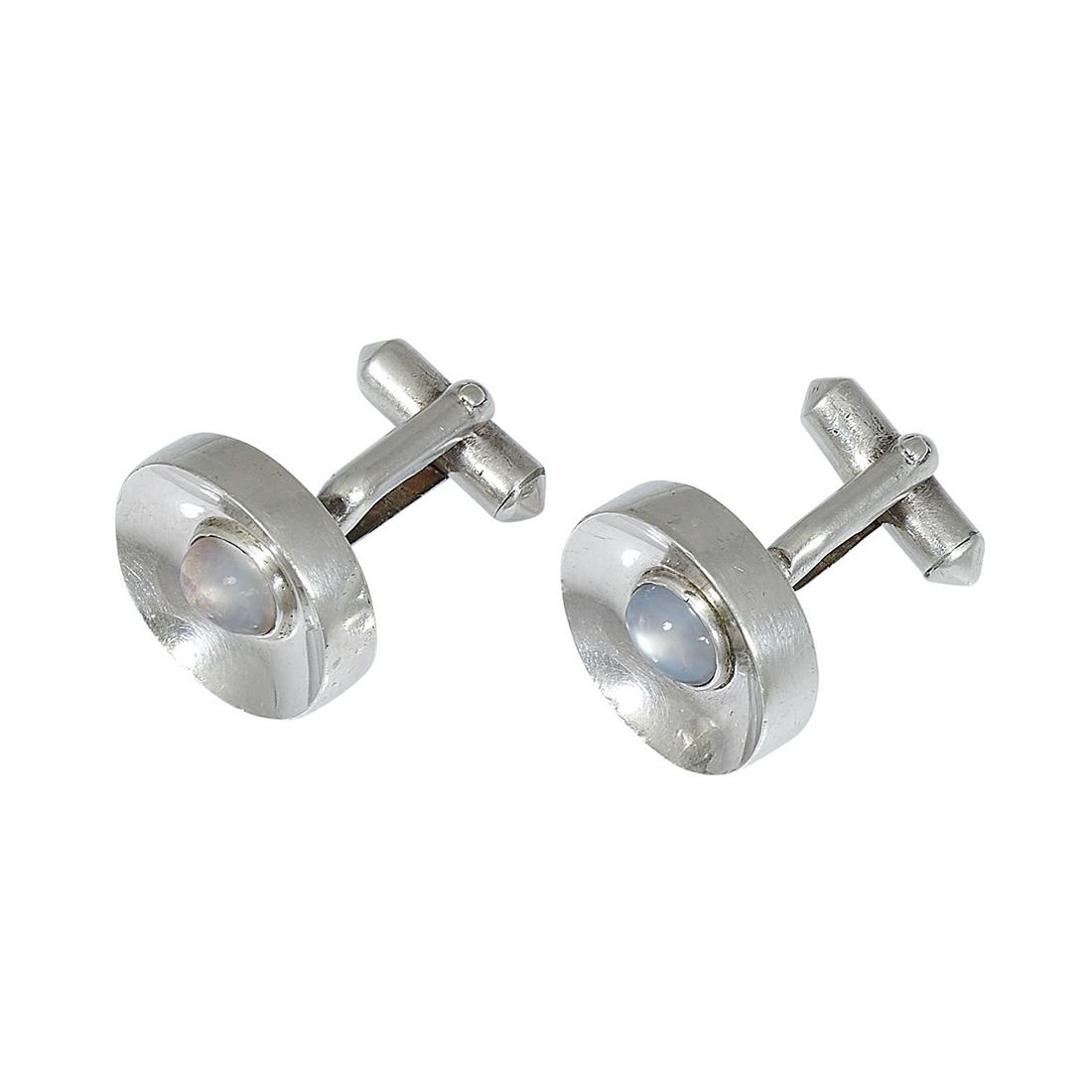 Antonio Pineda cufflinks: Antonio Pineda (1919-2009) cufflinks Taxco, Mexico .970 silver, moonstones stamped marks 12.0 dwts each (face): 11/16"w x 13/16"h