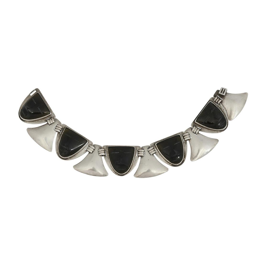 Fred Davis bracelet with mask motif (1 of 3)