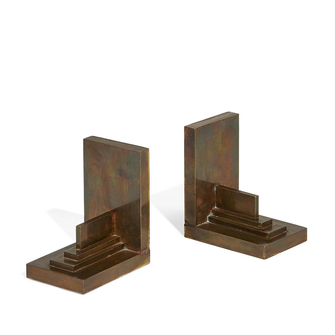 Kazimir Malevich (Attr.) Suprematism bookends: Attributed to Kazimir Malevich (1879-1935) Suprematism bookends, pair Russia, circa 1915 bronze unmarked each: 4 3/8"w x 3"d x 5"h