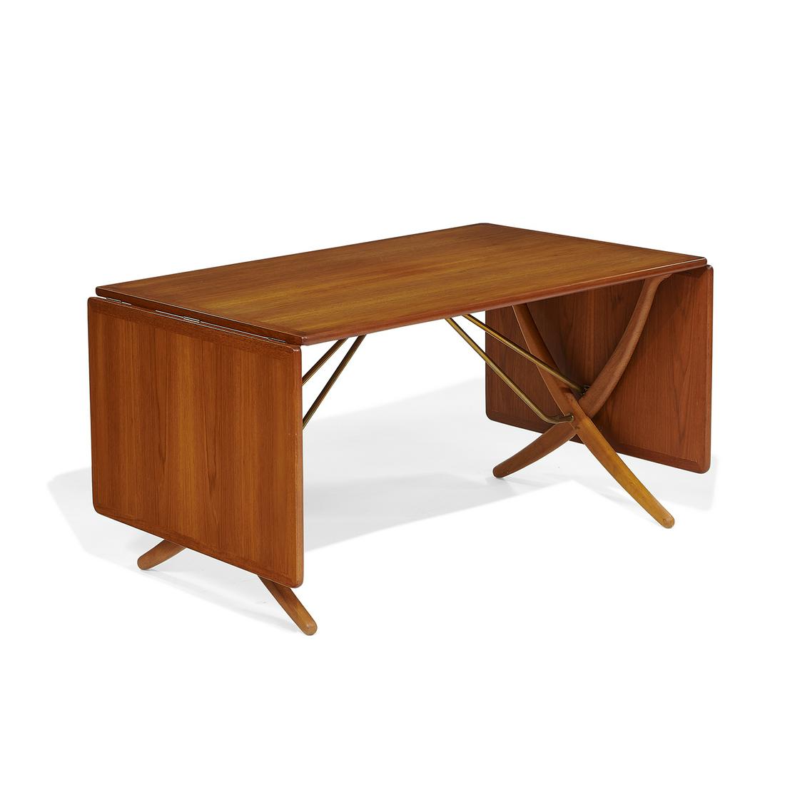 Hans Wegner Andreas Tuck dining table: Hans Wegner (1914-2007) for Andreas Tuck drop-leaf dining table, model AT304 Denmark, circa 1960 teak, oak, brass branded maker's marks 'Fabrikat Andr. Tuck Arkitekt Hans J Wegner Denmark — Made