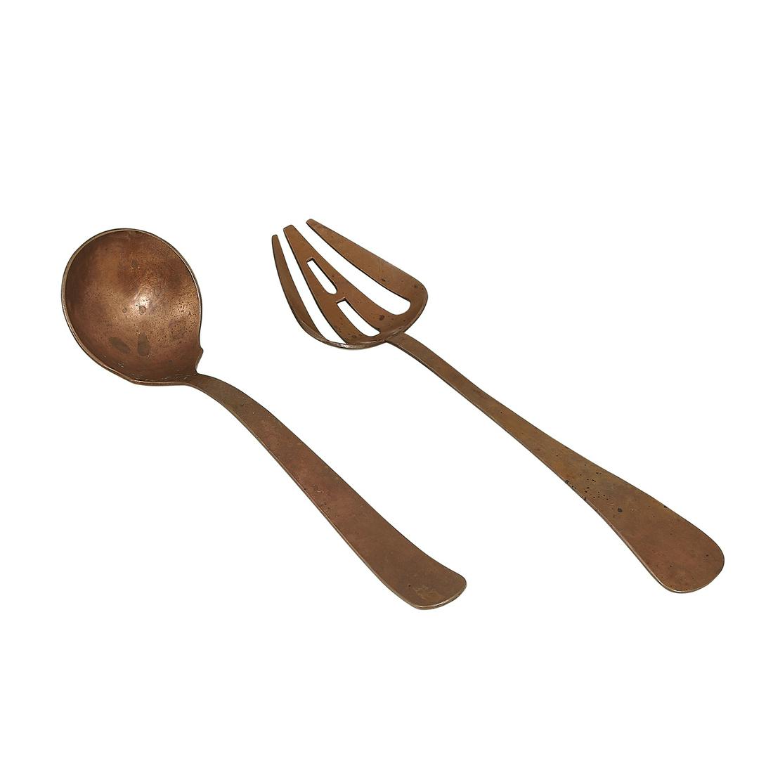 The Kalo Shop ladle and serving fork: The Kalo Shop ladle and serving fork Chicago, Illinois copper stamped marks fork: 2 9/16"w x 10 1/4"l Provenance: The Paul & Terry Somerson Collection of 20th and 21st Century Metalwork and Jewelry