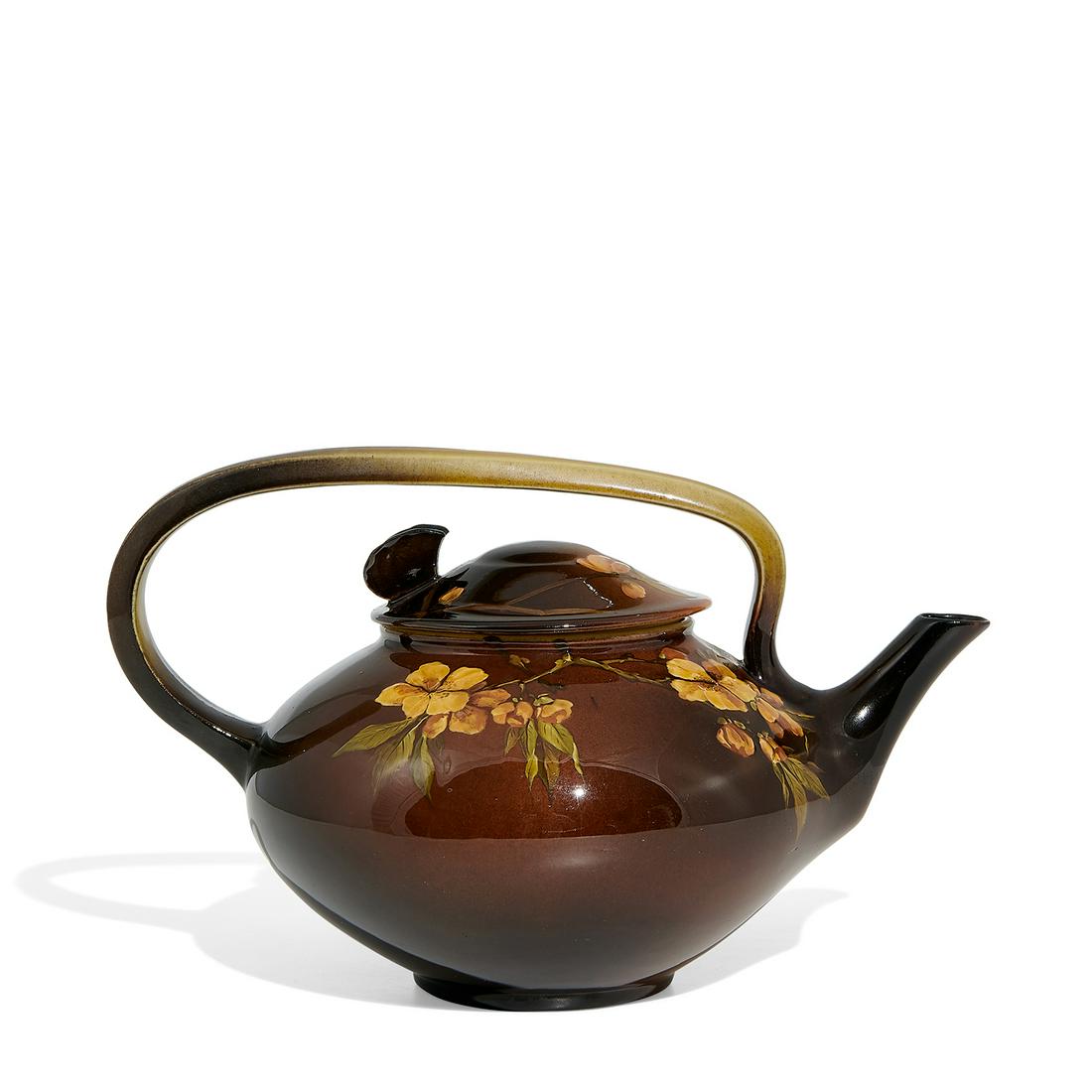 Anna M. Valentien, Rookwood Standard Glaze teapot: Anna Marie Valentien (1862-1947) for Rookwood Pottery earthenware Standard Glaze teapot with wild rose decoration and butterfly finial on the lid, shape number 404 Cincinnati, Ohio, 1888 high glazed c