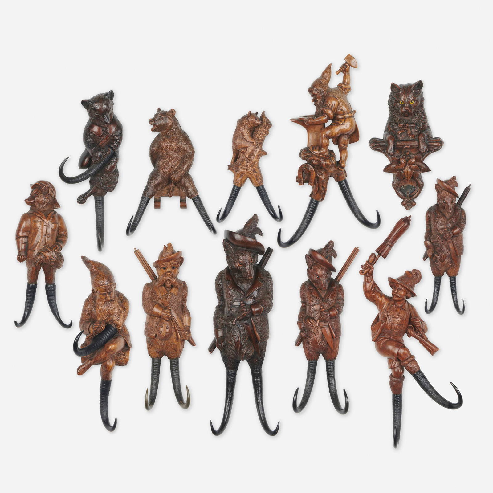 Black Forest, Twelve Carved Whip Holders Auction