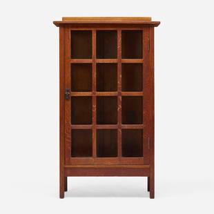 Gustav Stickley, China cabinet, model 820: Gustav Stickley China cabinet, model 820 USA, c. 1910oak, glass, iron 62.75 h x 36 w x 15 d in (159 x 91 x 38 cm) Cabinet features one door concealing three fixed shelves. Red manufacturer's d