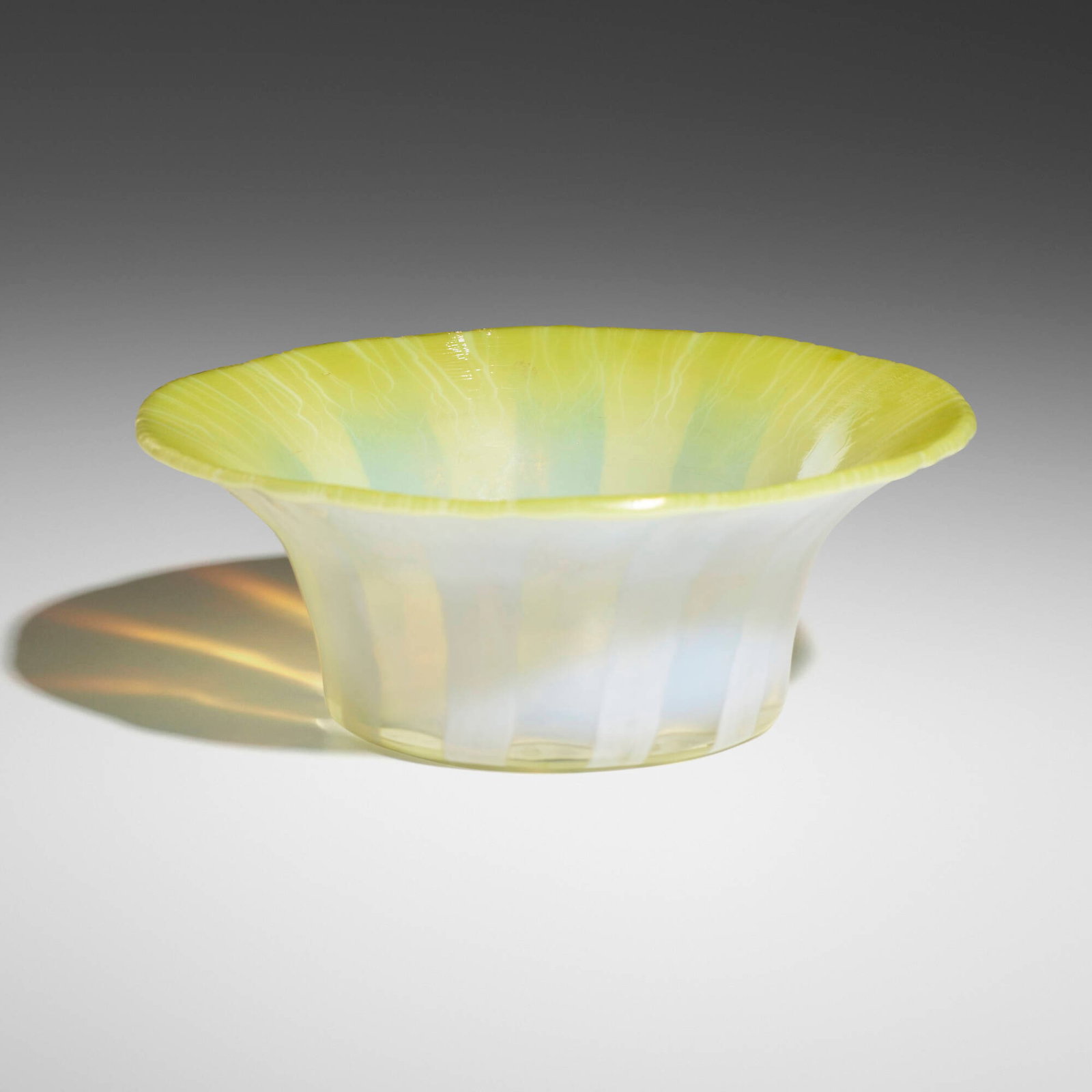 Tiffany Studios, Pastel bowl: Tiffany Studios Pastel bowl USA, c. 1920 hand-blown Favrile glass 1.875 h x 5 dia in (5 x 13 cm) Etched to underside '1777 L.C.T. Favrile'. Provenance: Important Collect