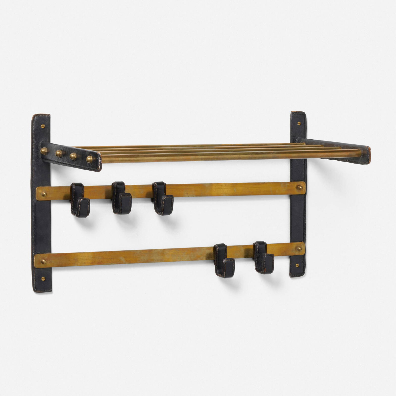 In the manner of Jacques Adnet, Wall-mounted coat rack (1 of 3)