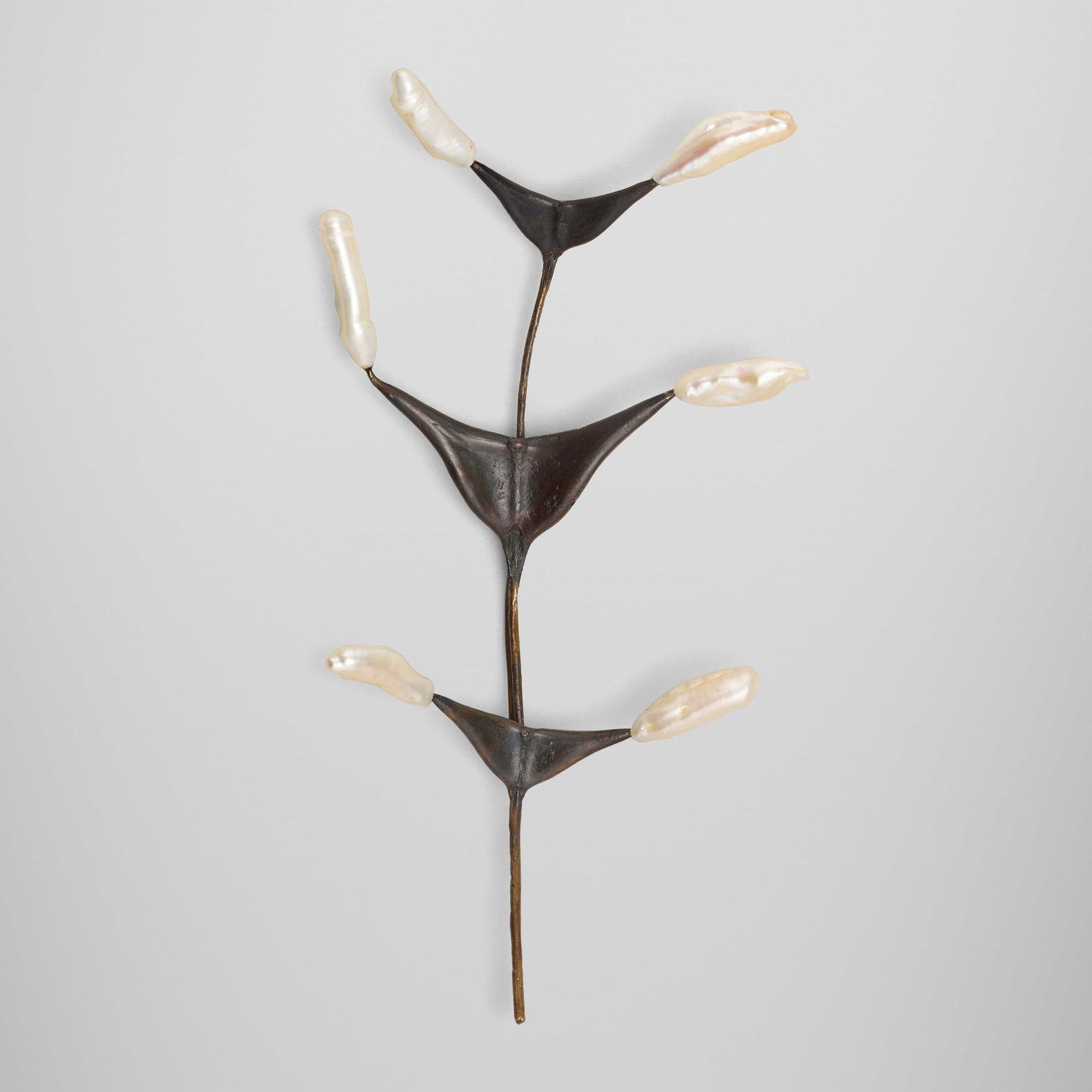 Michele Oka Doner, Brooch: Michele Oka Doner Brooch c. 2000bronze, baroque cultured pearl 3.25 w x 6.25 l in (8 x 16 cm) Provenance: Acquired directly from the artist, Private Collection | Thence by des