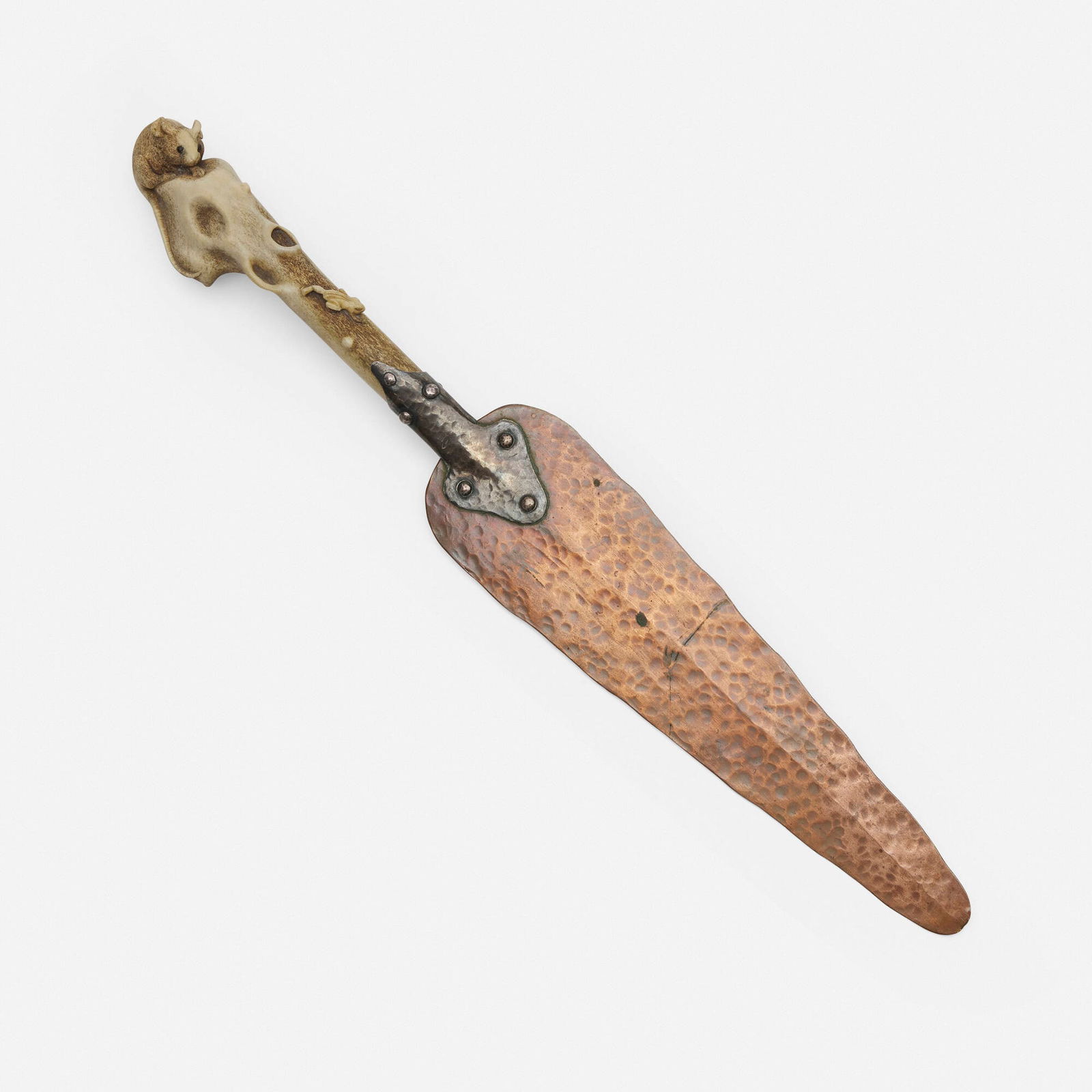 Joseph Heinrichs, Letter opener: Joseph Heinrichs Letter opener USA, c. 1890handwrought copper, silver, bone .75 h x 2 w x 13.5 l in (2 x 5 x 34 cm) The present work was retailed by Chester Billings & Son of New York.