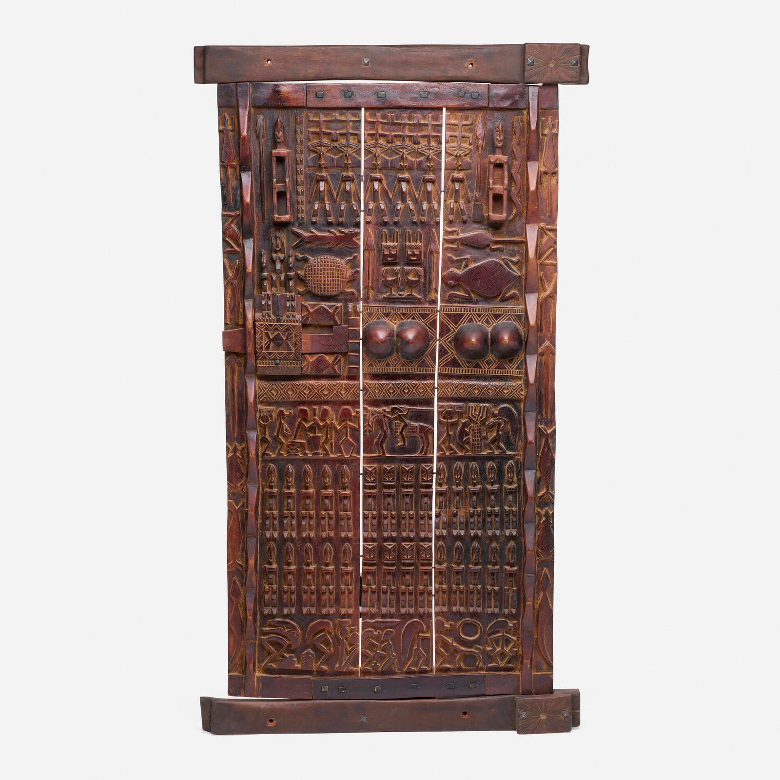 Dogon artist, Door with wall supports: Dogon artist Door with wall supports Mali, 20th century carved and stained wood 80.25 h x 44.75 w x 3.5 d in (204 x 114 x 9 cm) Provenance: Douglas Dawson Gallery, Chicago | Co